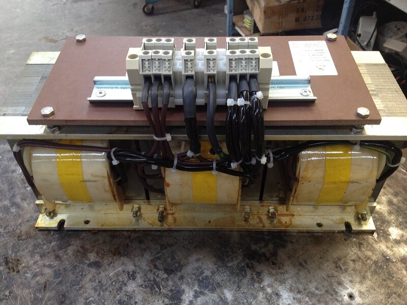 A custom transformer and terminal assembly