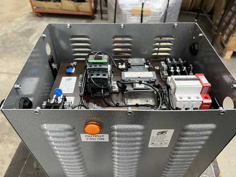 Enclosed unit with contactor, surge protection and an output-on lamp