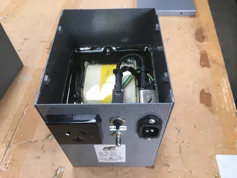 Enclosed 500VA isolating transformer with an IEC inlet and an NZ socket