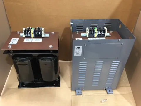 The same transformer open-frame and enclosed, side by side
